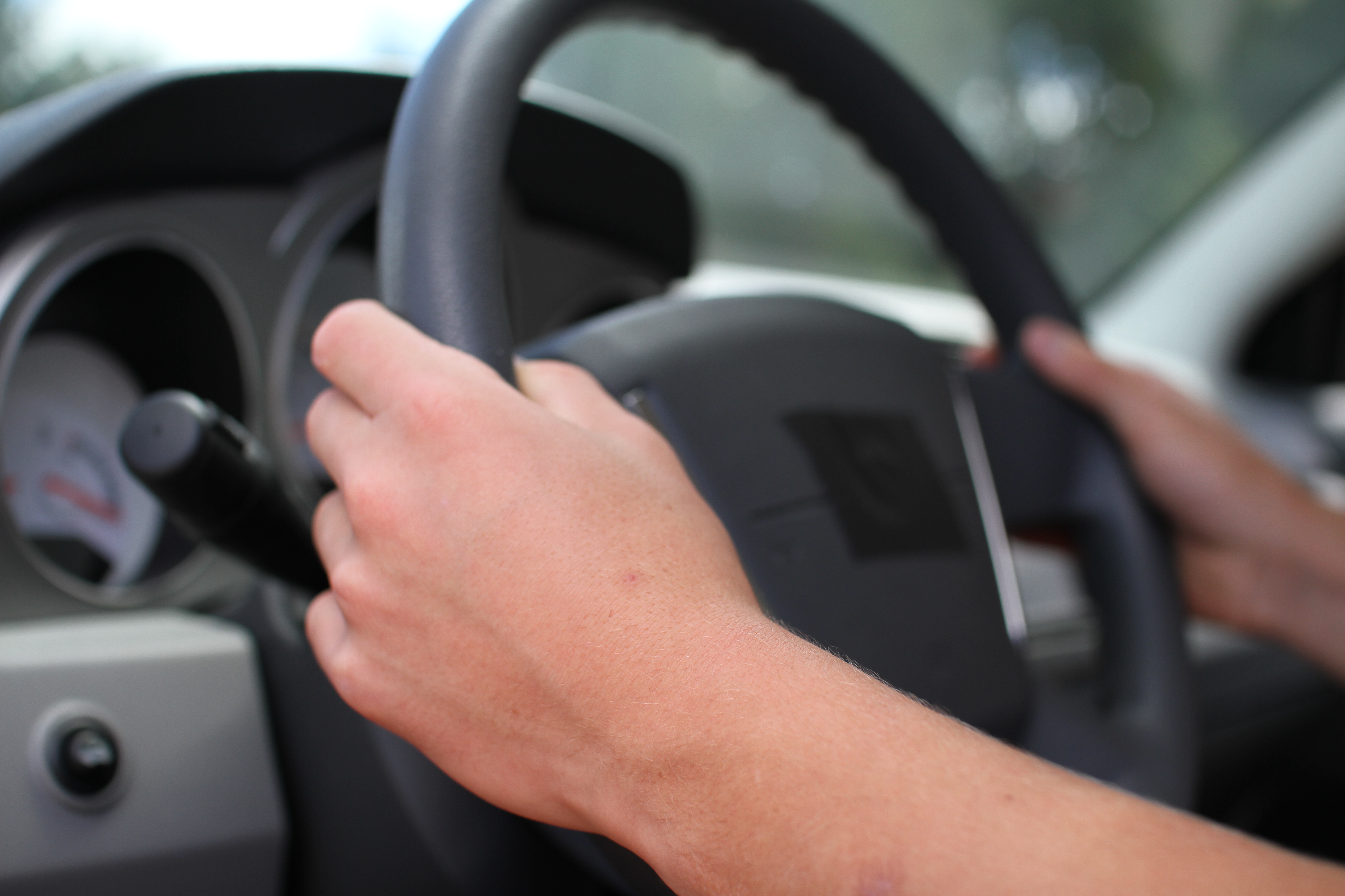 Driving Holding a Steering Wheel