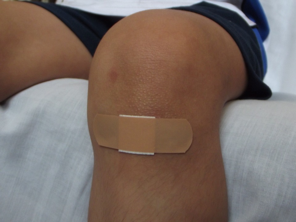 Knee Wound with bandaid